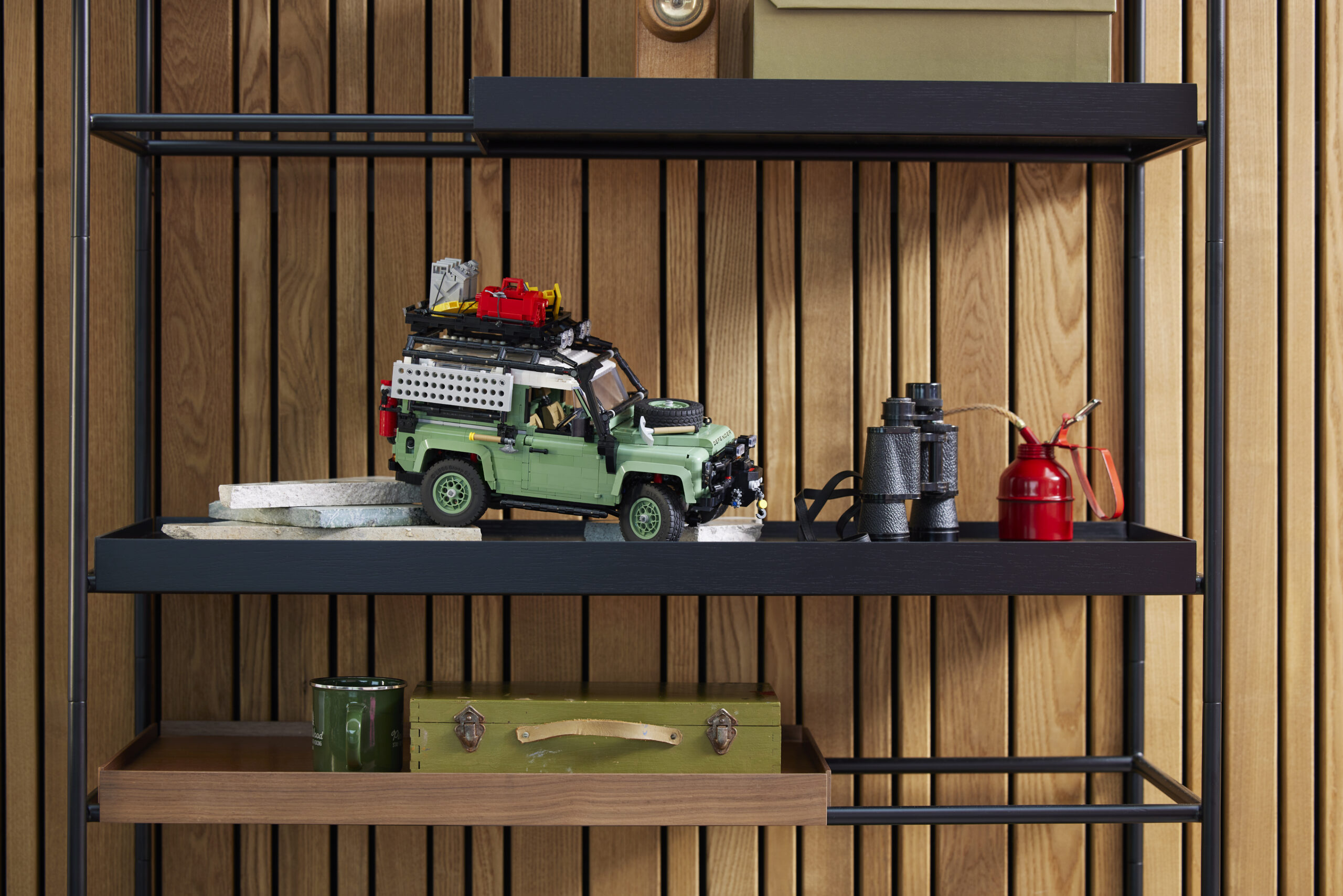 lego defender 90 on a bookshelf